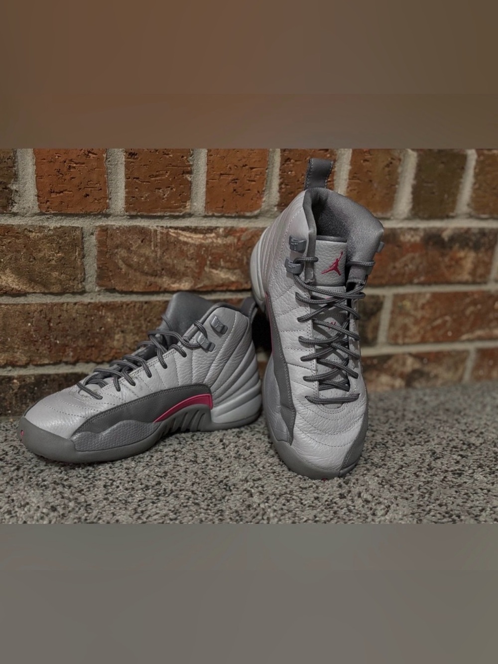 Air Jordan women’s High-Top Sneakers in Gray with Pink Accent